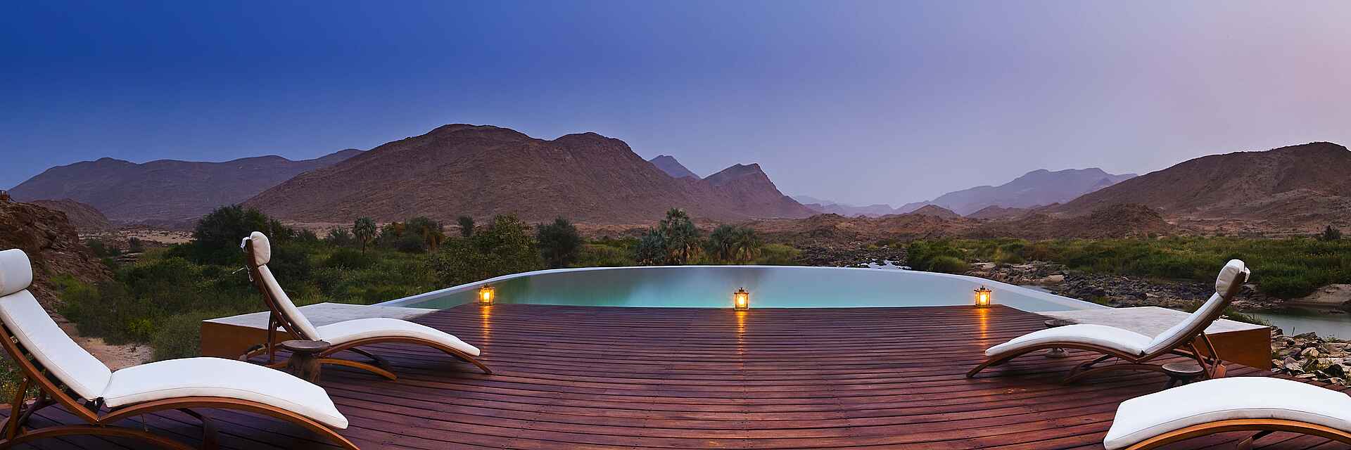 Abgeschiedenheit, afrikarma, afrikarma.de, buchen, Damaraland, Entspannung, Erholung, Fly In, Himba, Himba Dorf, Himba-Stamm, Information, Kultur, Kunene, Kunene Region, Kunene River, Marienfluss, Marienfluss Region, Namibe, Namibia, Nordnamibia, Nordwestnamibia, Okahirongo, Okahirongo Lodges and Camps, Okahirongo River Camp, Otupambua, Otupambua Stromschnellen, Privatsphäre, Reise, Reisen, Reiseveranstalter, River Camp, Ruhe, Safari, südliches Afrika, Urlaub, www.afrikarma.de, Deck, Deck Chair, Infinity Pool, Main Area, Pool, schwimmen, Sonnendeck, Sonnenliegen, Swimming Pool