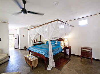 Ibo Island Lodge: Schlafbereich im Gartenzimmer Schmetterling