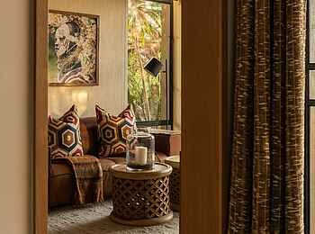 Singita Kilima Villa: Suite Lounge Singita Kilima Villa: Suite Lounge