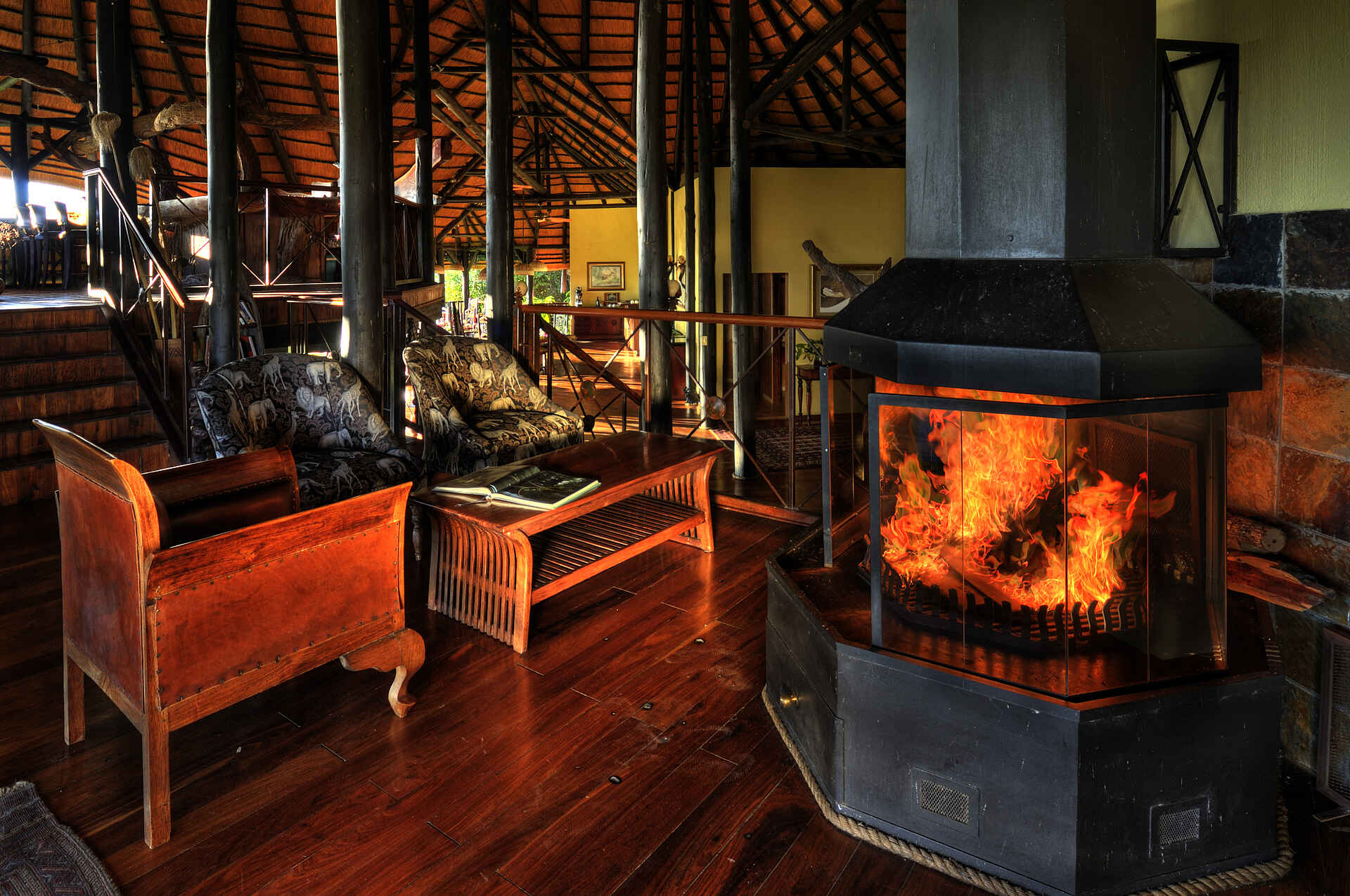 Caprivi Floodplains, Caprivi Strip, Caprivi-Streifen, Chobe National Park, Chobe River, Chobe Savanna Lodge, Desert & Delta, Elefanten, Kasane, Namibia, Thatched Roof, Kaminfeuer, Lounge, Air Conditioning