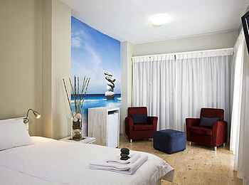 Swakopmund Guesthouse: Gästezimmer mit Bildtapete Swakopmund Guesthouse: Gästezimmer mit Bildtapete