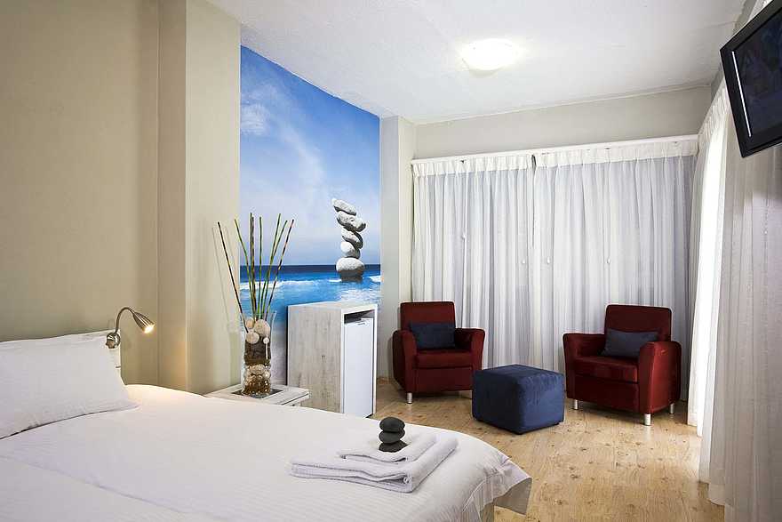 Swakopmund Guesthouse: Gästezimmer mit Bildtapete Swakopmund Guesthouse: Gästezimmer mit Bildtapete