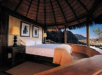 Mowani Mountain Camp: Schlafzimmer einer Suite