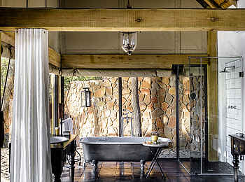 Singita Ebony Lodge: Blick in das Bad einer Suite Singita Ebony Lodge: Blick in das Bad einer Suite