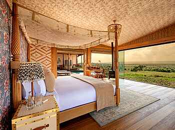 One Nature Mara River Lodge: Luxuriöses Schlafzimmer
