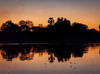 Gomoti Plains Camp: Abendrot am Fluss
