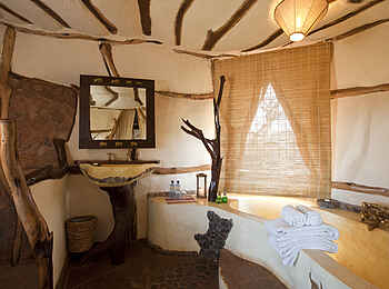 Elerai Camp: Das Badezimmer im Cottage Elerai Camp: Das Badezimmer im Cottage