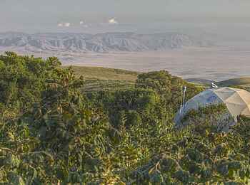 The Highlands Camp: Blick auf tiefer gelegene Landschaften
