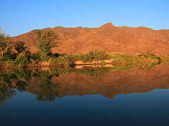 Okahirongo River Camp: Spiegelung Okahirongo River Camp: Spiegelung