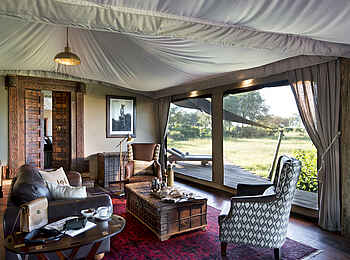 Duba Plains Suite: Lounge und Sansibar-Tür