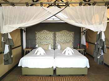 Kavinga Safari Camp: Gästezelt mit Einzelbetten Kavinga Safari Camp: Gästezelt mit Einzelbetten