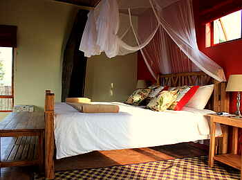 Chameleon Hills Lodge: Blick in ein Gästezimmer mit Doppelbett