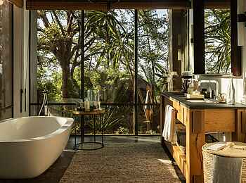 Singita Kilima Villa: Suite Bad Singita Kilima Villa: Suite Bad