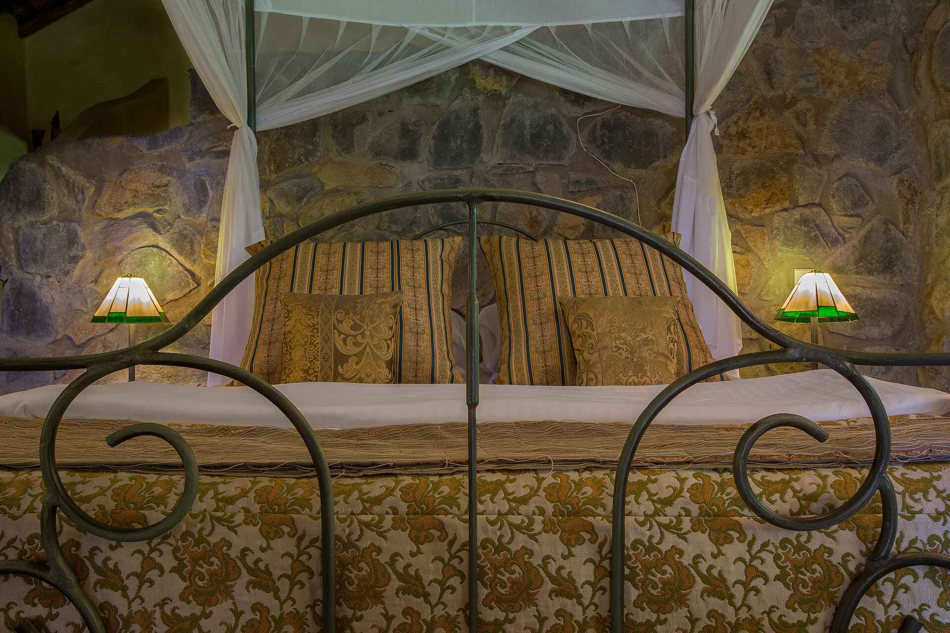 Arusha, Arusha Nationalpark, Rivertrees, Rivertrees Country Inn, Ambient, Bett, Design, Interior, River House, Schlafzimmer, Afrikarma, Afrikarma Safaris, Afrikarma Safaris - Wildnis. Hautnah., afrikarma.de