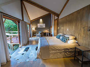 Splash Camp: Gästechalet mit Holzdeck