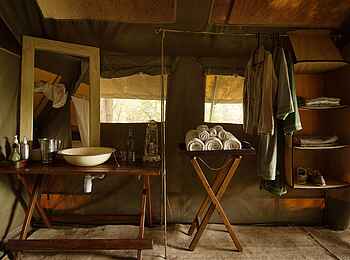 Serian's Nkorombo Mobile Camp: Safari Tent Bad