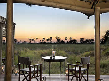 Nxabega Okavango Tented Camp: Terrasse bei Sonnenuntergang