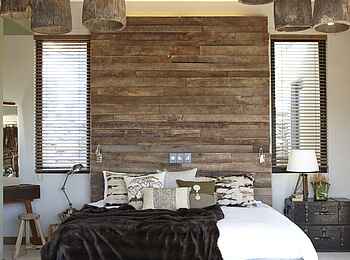 The Olive Exclusive: Caprivi - Doppelbett und Kuhfell