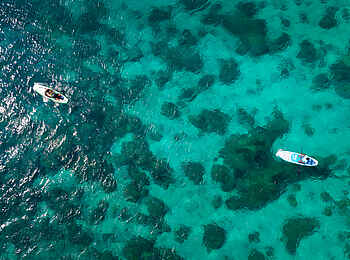 Bawe Island: Stand-Up-Paddlen auf klarem Wasser