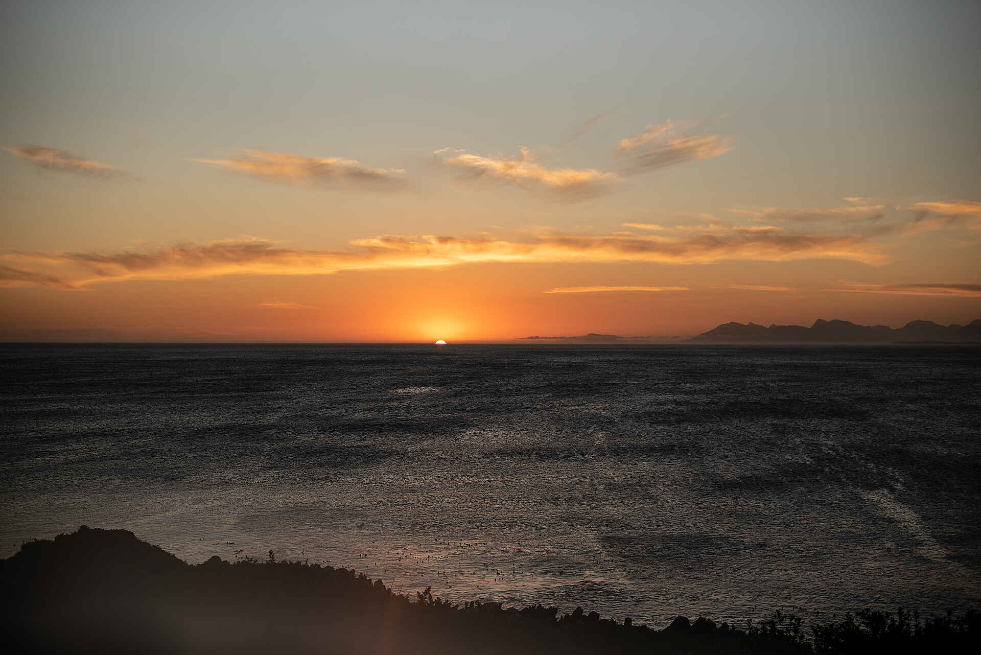 Whalesong Lodge: Sonnenuntergang am Meer