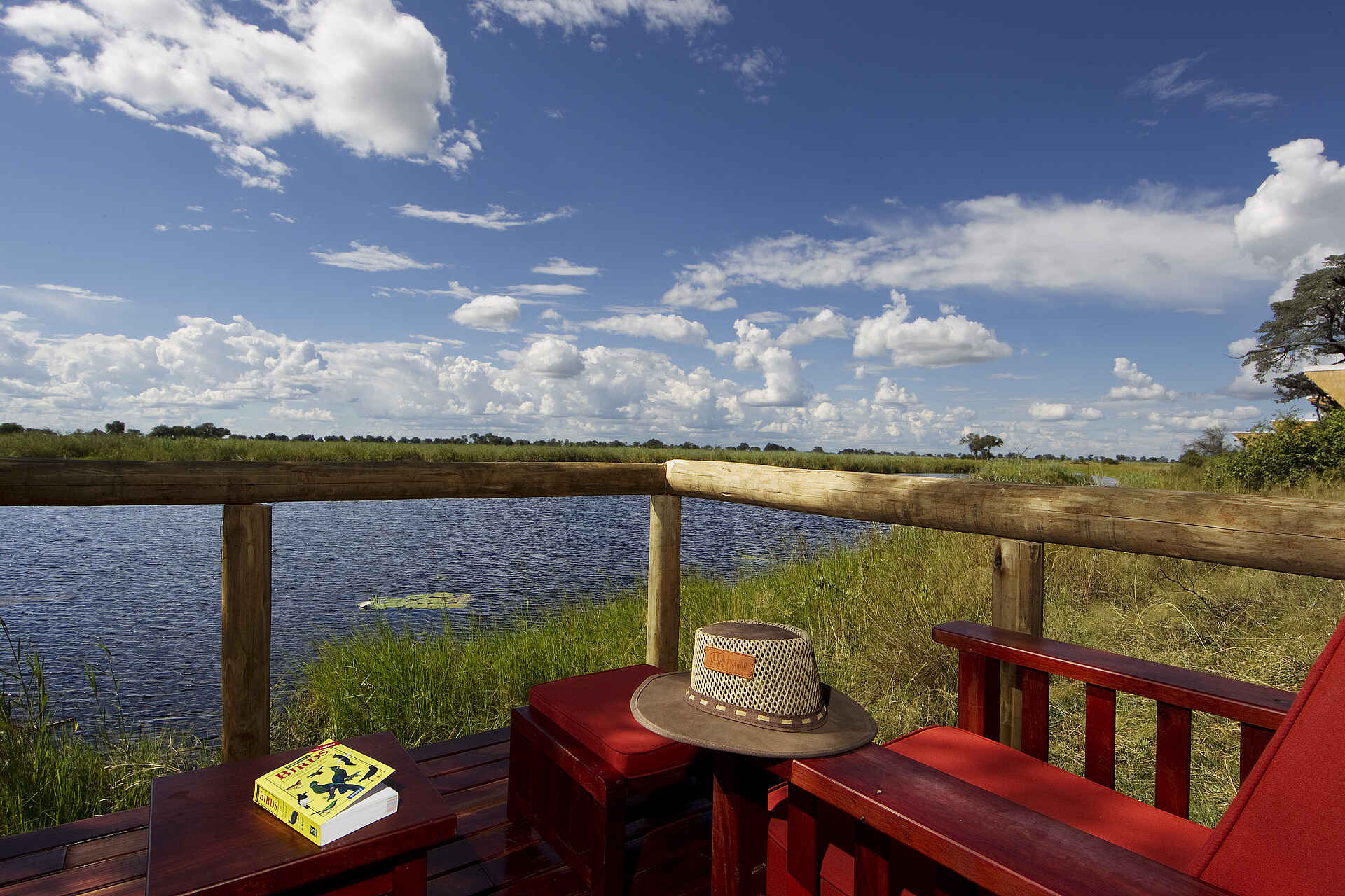 Buch, Caprivi, Cuando, Deck, Gästechalet, Gästezelt, Hut, Kwando, Kwando River, Kwando Safaris, Lagune, Lagunenblick, NG 14, NG 14 Kwando Konzession, Private Veranda, Privates Deck, Veranda, Kwando Lagoon, Kwando Lagoon Camp, Lagoon Camp