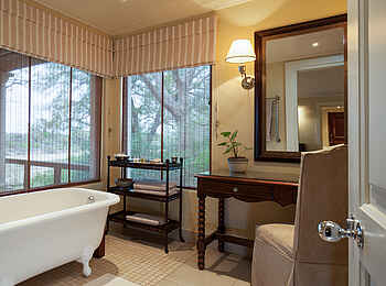 MalaMala Rattrays Camp: Badezimmer der Gästevilla MalaMala Rattrays Camp: Badezimmer der Gästevilla