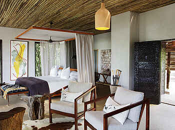 Matetsi Victoria Falls: Suite mit Sitzecke und Bett Matetsi Victoria Falls: Suite mit Sitzecke und Bett