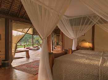 Saruni Mara Camp: Doppelbett mit Moskitonetz