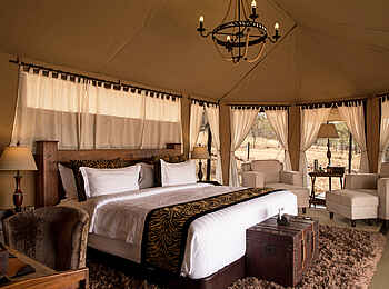 Ole Serai Luxury Camp - Moru Kopjes: Zelt mit Doppelbett Ole Serai Luxury Camp - Moru Kopjes: Zelt mit Doppelbett