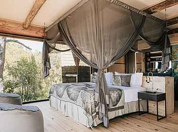 Vumbura Plains Camp: Family Room Bett