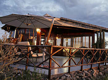 Vingerklip Lodge: Das Heaven's Gate Luxuschalet aus der Aussenperspektive mit Veranda