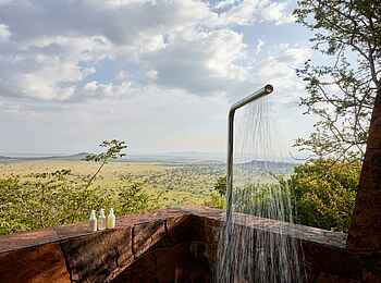 Singita Kilima Villa: Junior Suite Außendusche Singita Kilima Villa: Junior Suite Außendusche