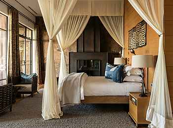 Singita Kilima Villa: Suite Bett Singita Kilima Villa: Suite Bett