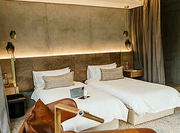 Cheetah Plains Mapogo House: Doppelbett einer Suite Cheetah Plains Mapogo House: Doppelbett einer Suite