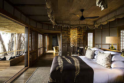 Mombo Camp: Suite Bett