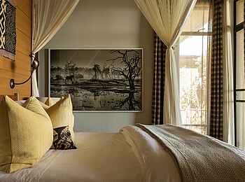 Singita Kilima Villa: Junior Suite Bett Singita Kilima Villa: Junior Suite Bett