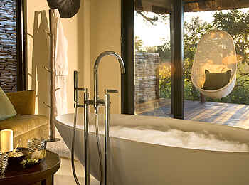 Lion Sands River Lodge: Badezimmer bei Sonnenaufgang